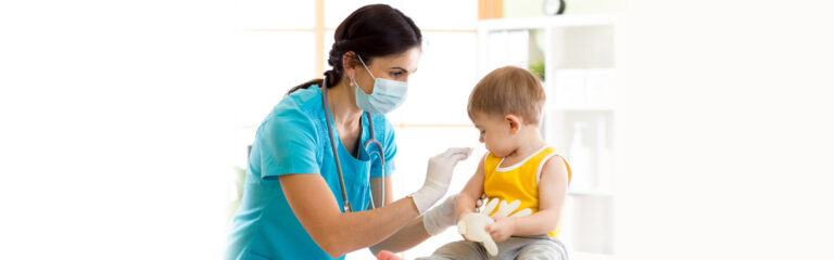 Nurse vaccinating child at pediatric urgent care in Abilene